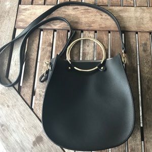 Small, black, leather-ish handbag/ crossbody purse